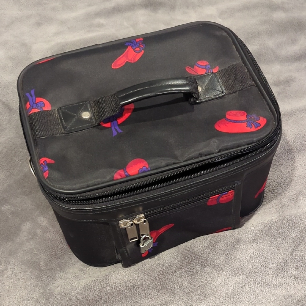Black Travel Case with Red Hat Design